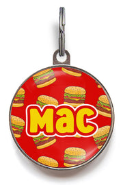 Cheeseburger dog name tag with cartoon burger pattern, red background, and custom pet name “Mac” on front – funny burger-themed ID tag for pets.