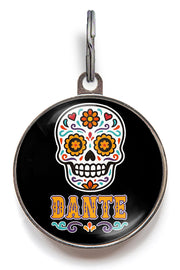 Day of the Dead dog tag featuring colourful sugar skull with pet name “Dante” – personalised Halloween pet ID tag for dogs and cats