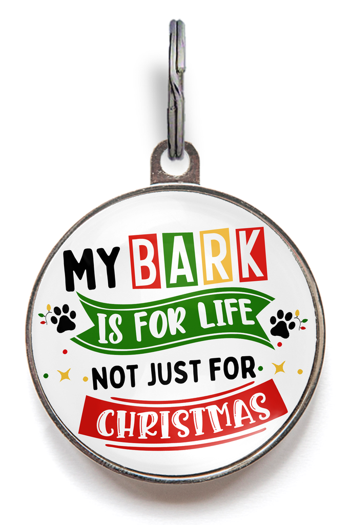 Christmas dog tag reading “My Bark Is For Life, Not Just For Christmas