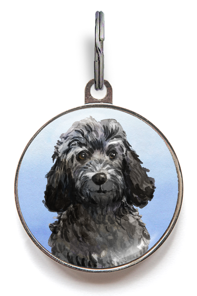 Custom dog tag with black Cockapoo illustration on blue background