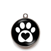Black heart paw dog ID tag with white paw print and heart icon