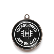 Black microchipped info on back dog ID tag with chip icon