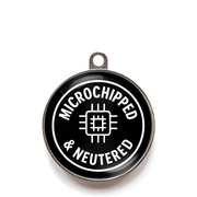Black microchipped and neutered dog ID tag with white chip icon