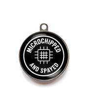 Black microchipped and spayed dog ID tag with chip icon