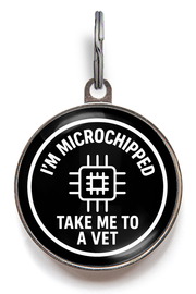 Pet tag with 'I'm microchipped, take me to a vet' text on a white background