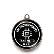 Black microchipped take me to a vet dog ID tag