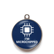 Blue I’m microchipped dog ID tag with chip icon