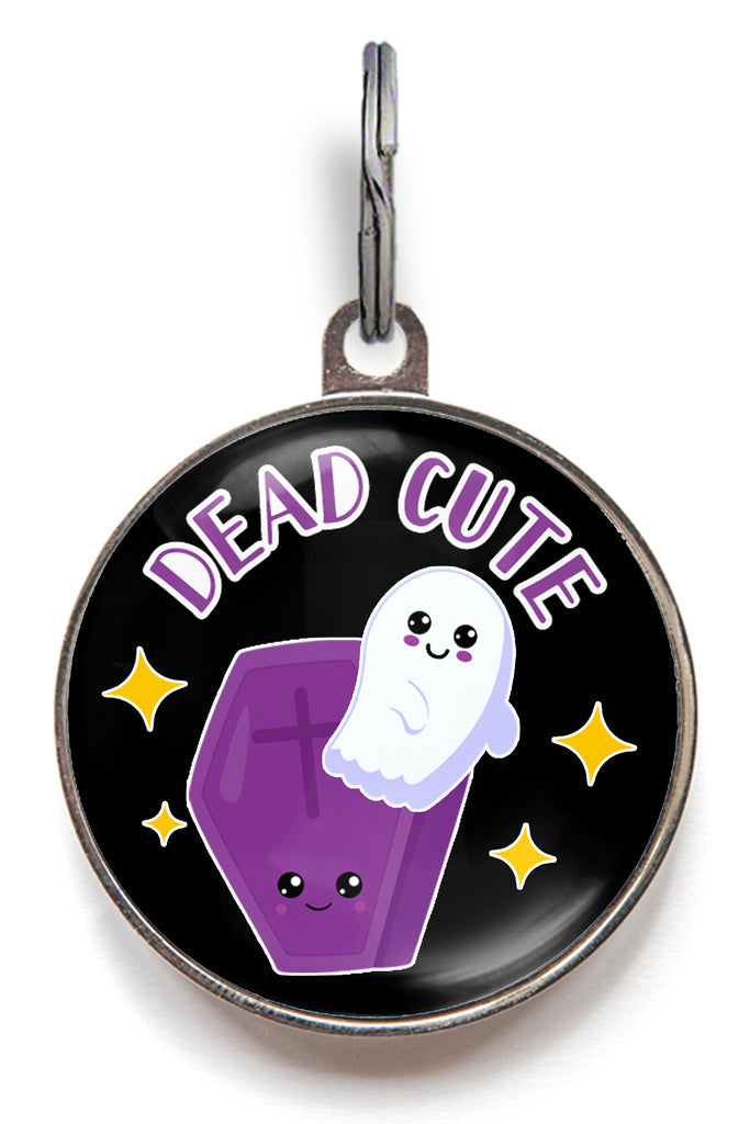 Halloween pet tag with ghost popping from purple coffin and text “Dead Cute”