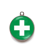 Green classic cross dog ID tag with white medical-style cross icon