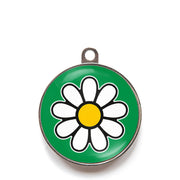 Green daisy dog ID tag with white flower icon
