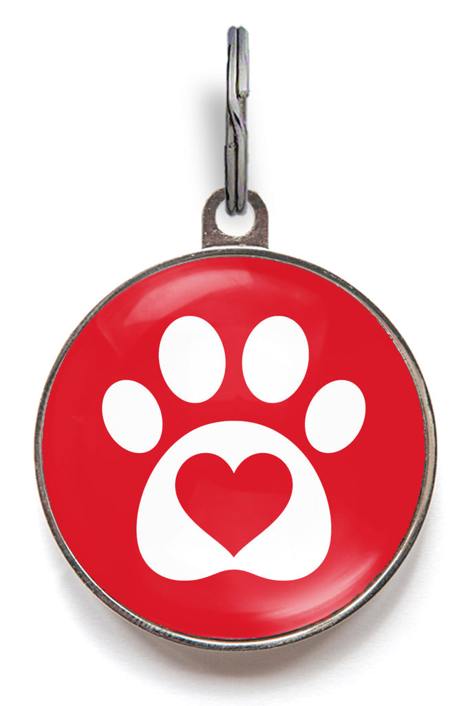 Red heart paw dog ID tag with white paw print and heart icon and glossy resin finish