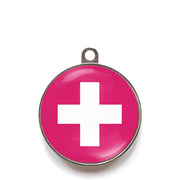 Pink classic cross dog ID tag with white medical-style cross icon