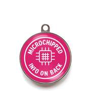 Pink microchipped info on back dog ID tag with chip icon