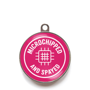Pink microchipped and spayed pet tag