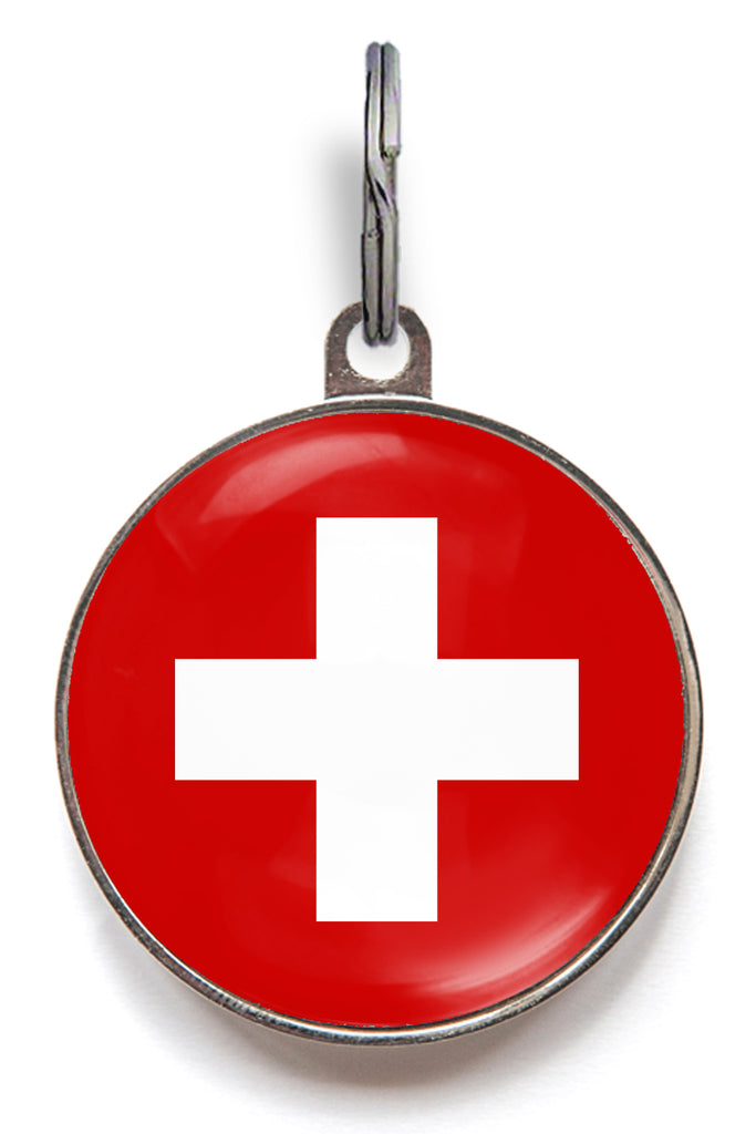 Red classic cross dog ID tag with white medical-style cross icon