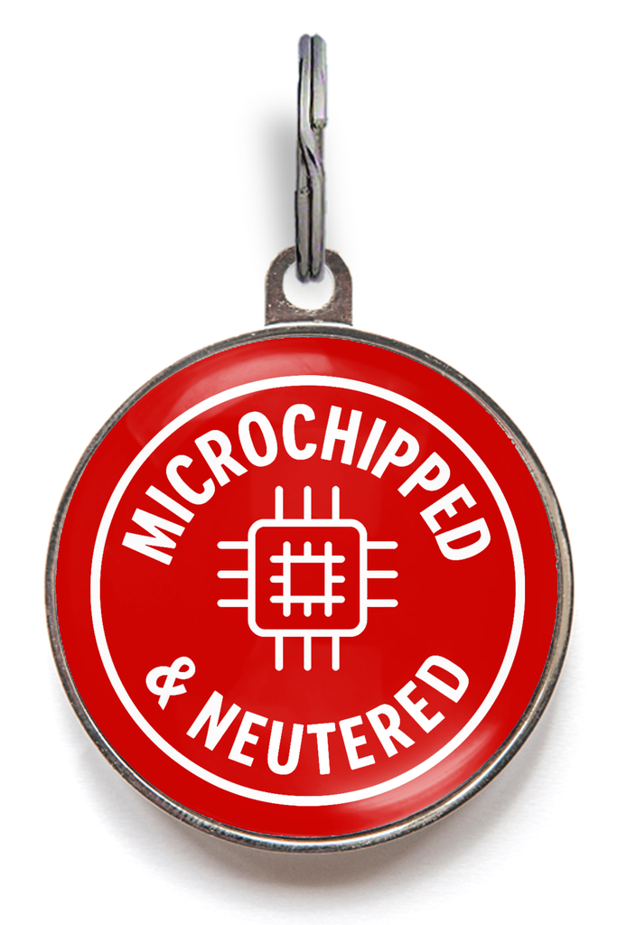 Red microchipped and neutered dog ID tag with white chip icon