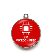 Red I’m microchipped dog ID tag with chip icon