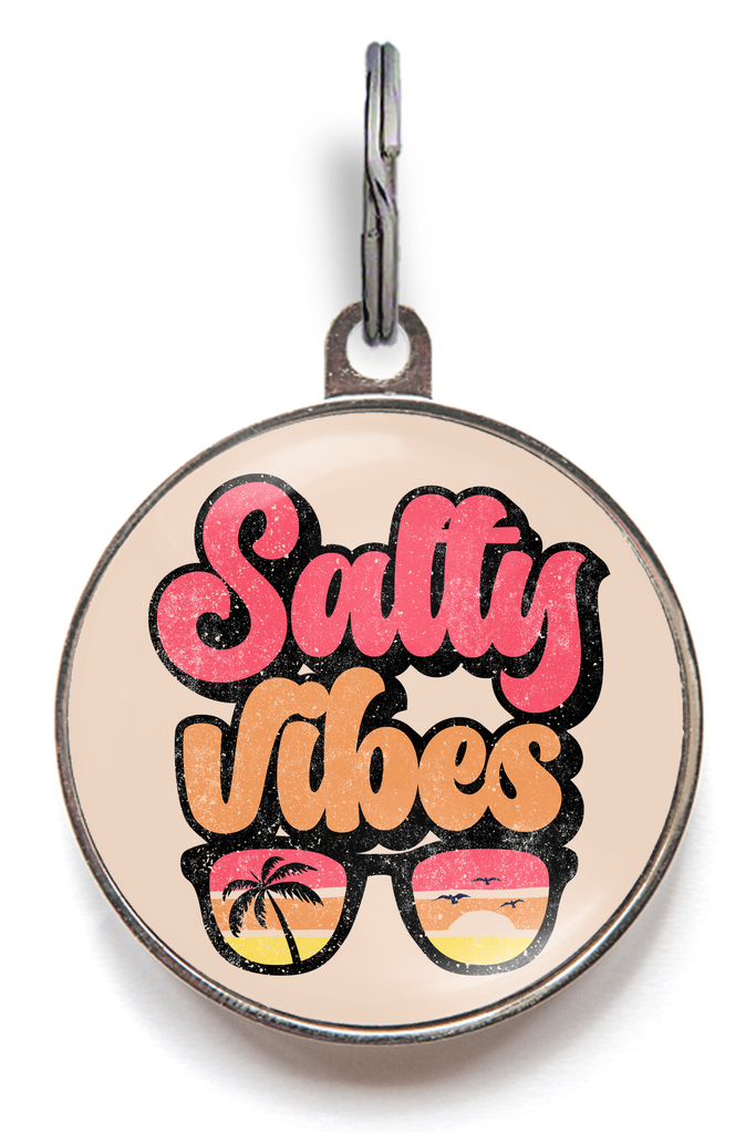 Retro style "Salty Vibes" pet tag, featuring sunglasses reflecting a beach sunset