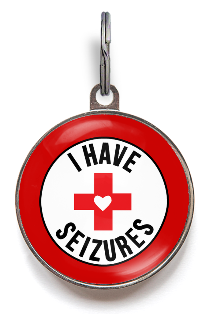 Seizure dog tag reading “I Have Seizures,” with split ring ready to be attached to a dog collar - ideal epilepsy dog tag for medical alerts