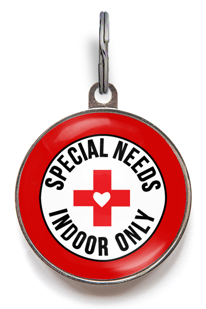 Special needs dog tag with “Special Needs – Indoor Only” printed on it, easy to attach to a collar for dogs requiring extra care and indoor safety