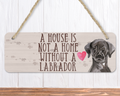 A House Is Not A Home Without A Black Labrador Sign